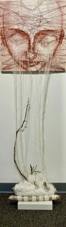 Recollections Rooted. Embracing Earth, watercolor, conté, paper, board, thread, wire, staples, found wood, fabric, live plants, 23" × 24"