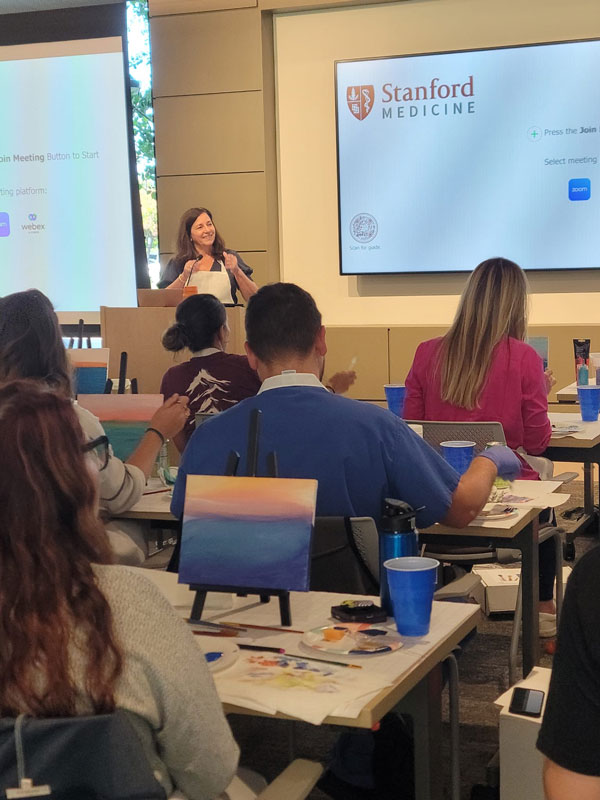 Shown here is Nicole presenting the "Art of Healing Workshop" for the CriticalCare Advanced Practice Providers at Stanford. 